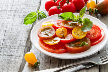 Colorful tomato salad basil 