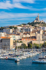 Notre Dame de la Garde and olf port in Marseille, France