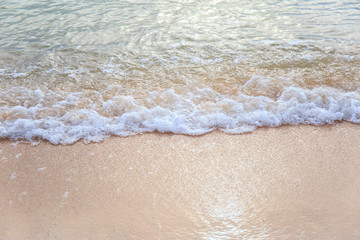 Sand beach with wave of the sea.