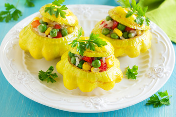 Small scallops stuffed with rice and vegetables. Selective focus.