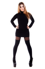 Fototapeta premium Pretty young woman in a black dress