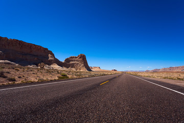 Road with rocks on left side, Death valley desert