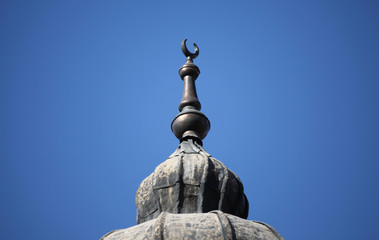 A very old bronze crescent on top of a minaret