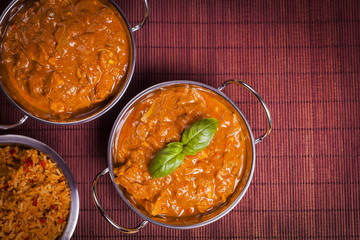Chicken Tikka Masala Curry on Rattan Background