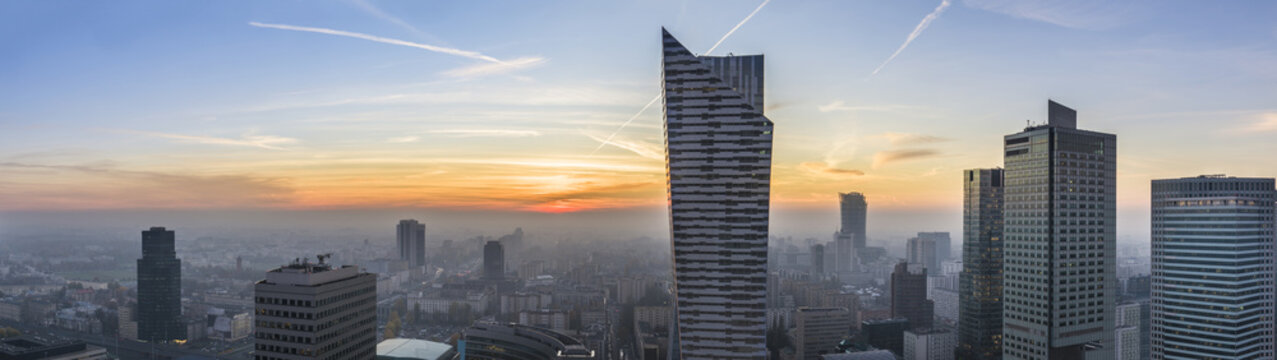 Fototapeta Foggy sundown over Warsaw