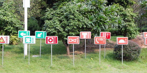 Warning signs in a Chinese city park