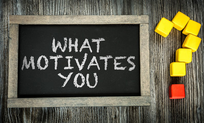 What Motivates You? written on chalkboard