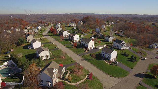 An aerial shot of a typical western Pennsylvania residential neighborhood in late Autumn.	