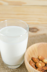 almond milk on wooden table