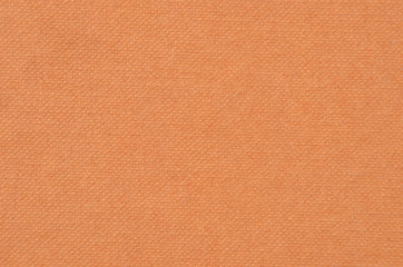 Embossed cardboard background, brown color, close up