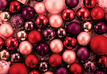 Background of colored Christmas tree balls and decorations vintage filtered