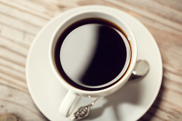 Cup of Coffee on a rustic table