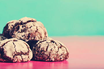 Homemade baked chocolate snacks on bright pastel background