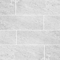 Fototapeta premium White natural sand stone tile wall seamless background and texture