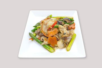 Fried noodle in gravy with seafood and fresh vegetable