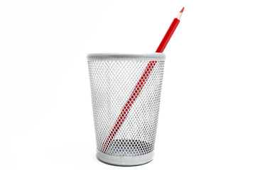 Colored pencils in a pencil case on white background