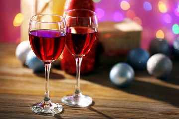 Wine and Christmas decoration on bright background