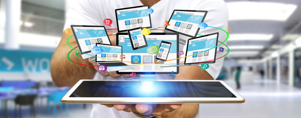Businessman connecting tech devices
