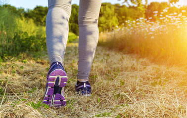 Woman running in a field