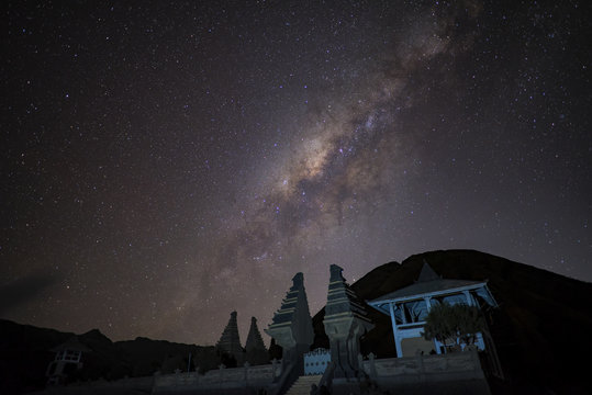 Milky way over Temple at Bromo mountain Java, Indonesia.