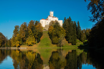 Fototapeta na wymiar Castle of Trakoscan on the hill in autumn, Zagorje, Croatia
