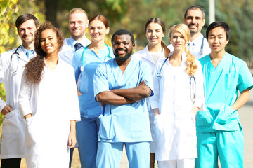 Smiling medics team, outdoors