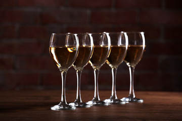 Half full wine glasses on a table