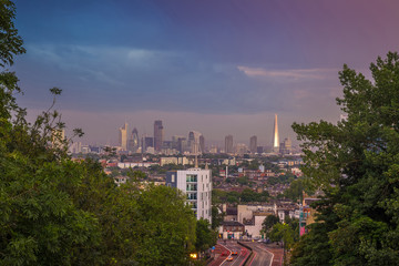 Skyline of central London after sunset from Holloway Bridge, UK