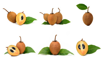 fresh sapodilla with leaves isolated on white background
