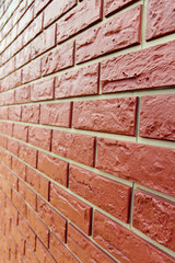 Close up of beautiful red brick artificial wall 