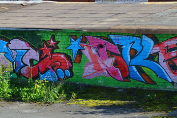 PERM, RUSSIA - JUN 25, 2014: Graffiti - popular form of urban