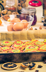 Christmas iced gingerbread baked baking sheet Kitchen table with