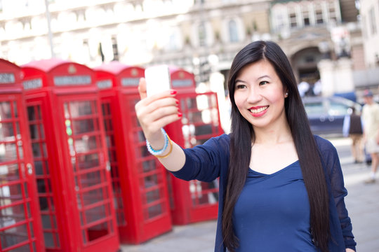 japanese girl in London takling a selfie