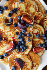 pancakes with blueberries and honey