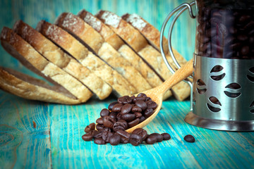 coffee beans and rye bread ,vintage tone