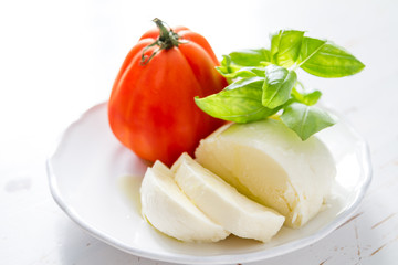 Tomato mazzarella, basil