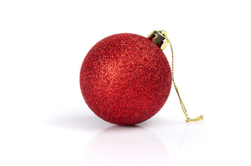 A red  christmas toy on a white background