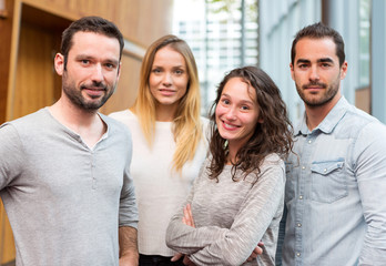 Portrait of a group of young attractive workers