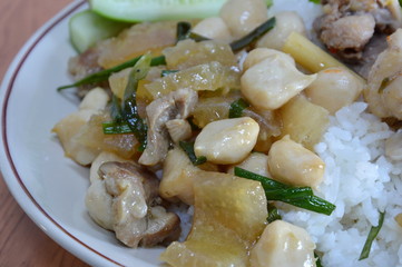 stir-fried pork skin with little fish ball on rice
