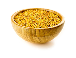 Bowl of yellow mustard seeds