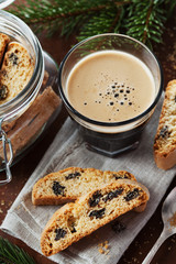 Coffee with biscotti or cantucci on wooden vintage table, traditional Italian biscuit or cookie