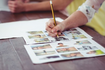 Close up of businesswoman working on documents