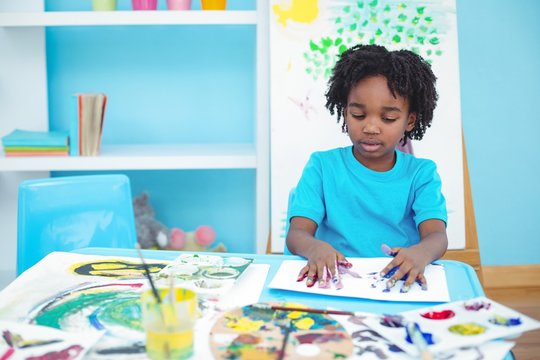 Happy Kid Enjoying Arts And Crafts Painting