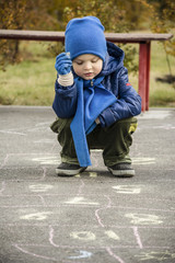 boy playing in the street