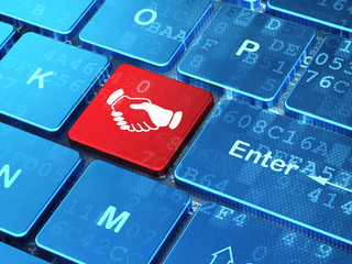 Politics concept: Handshake on computer keyboard background
