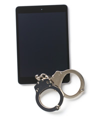 handcuffs and tablet