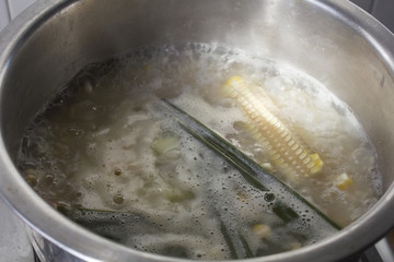 vegetarian porridge while boiling in stainless pot