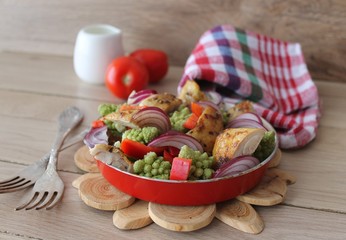 Salad with chicken, broccoli, onions and peppers with balsamic dressing