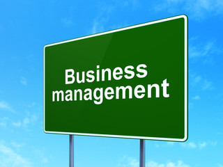 Business concept: Business Management on road sign background