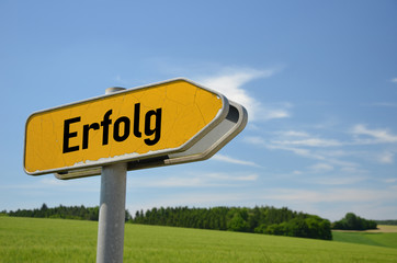 street sign which symbolizing the german word for success. Concept for success